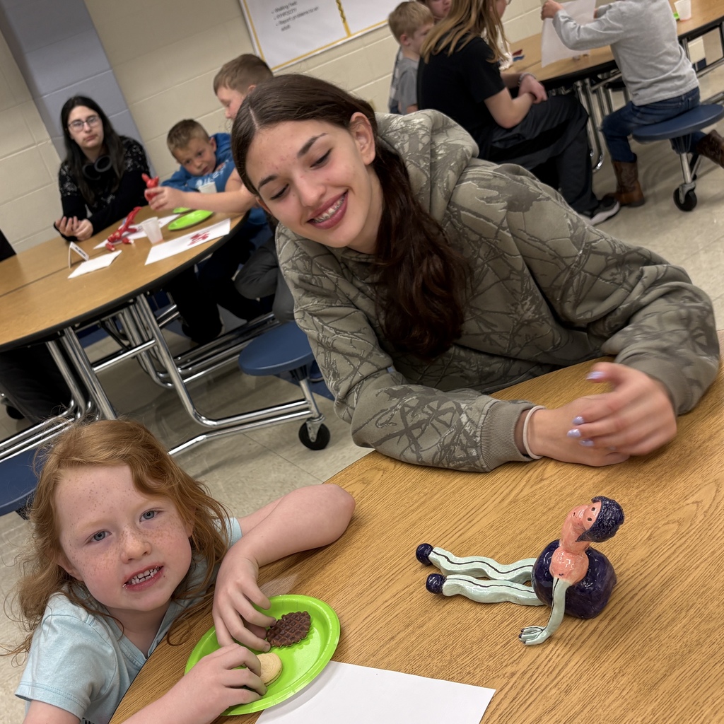 students posing with their 3d monster