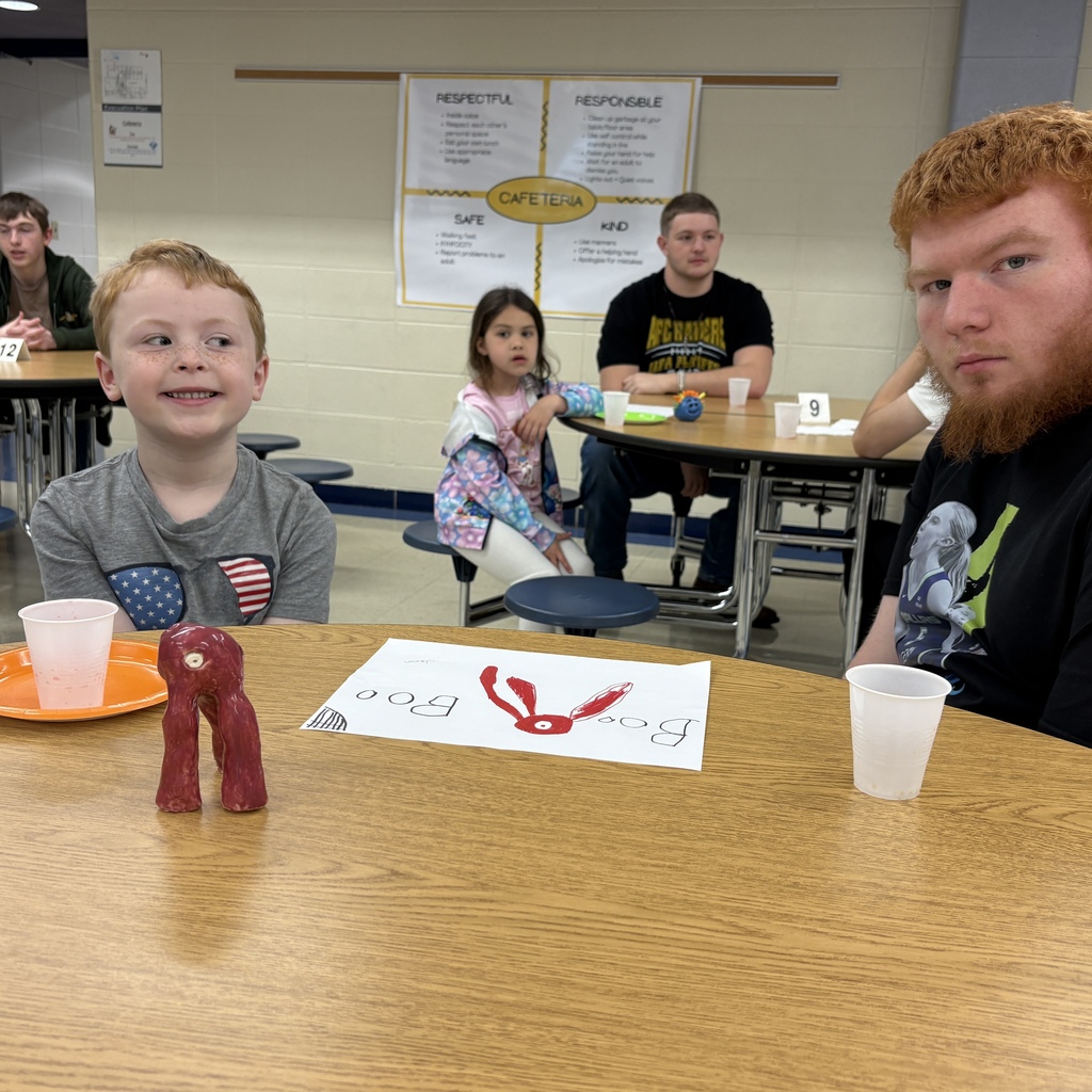 students posing with their 3d monster