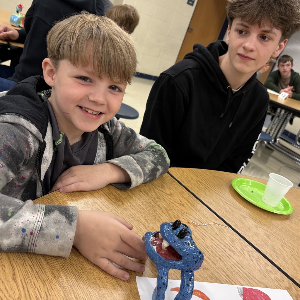 students posing with their 3d monster