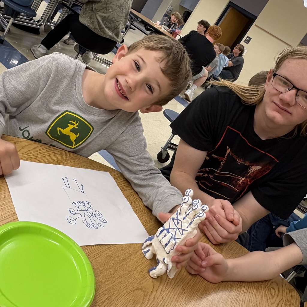 two students with their monster