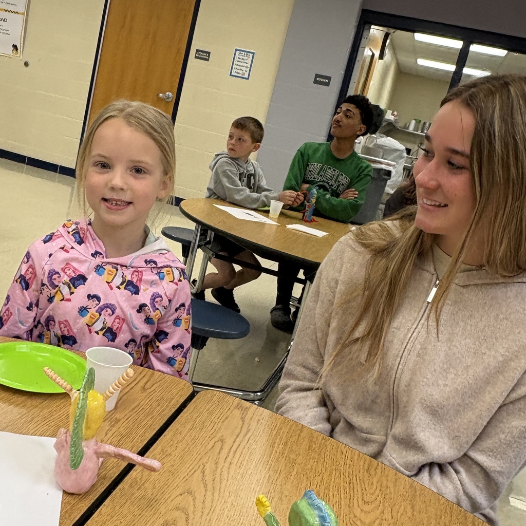 two students with their monster