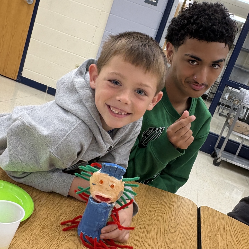 two students with their monster