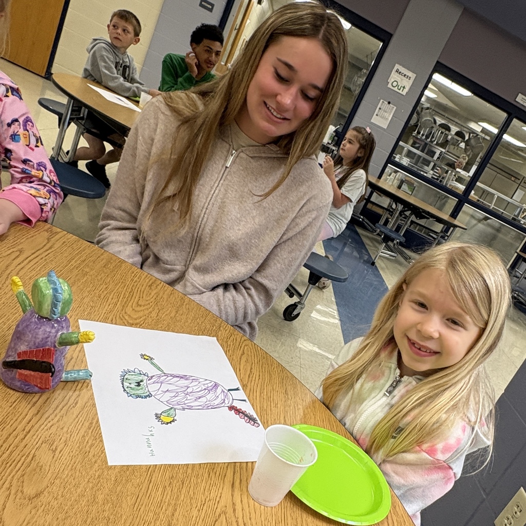two students with their monster