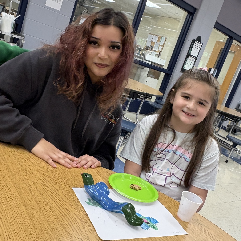 two students with their monster