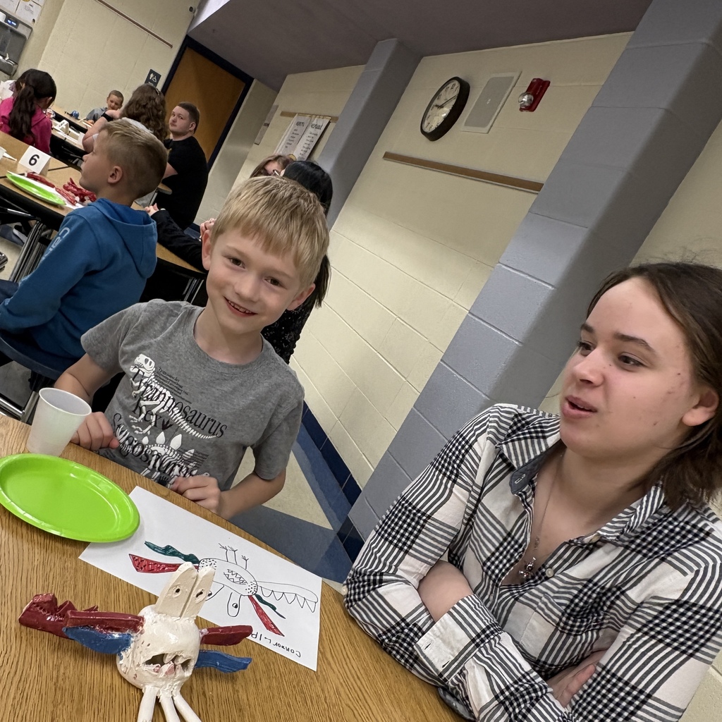 two students with their monster