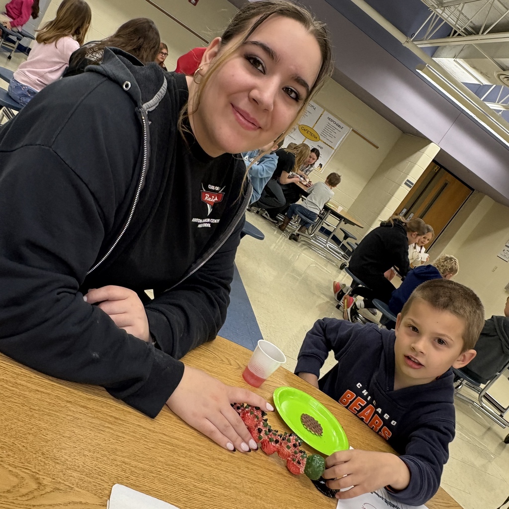 two students with their monster