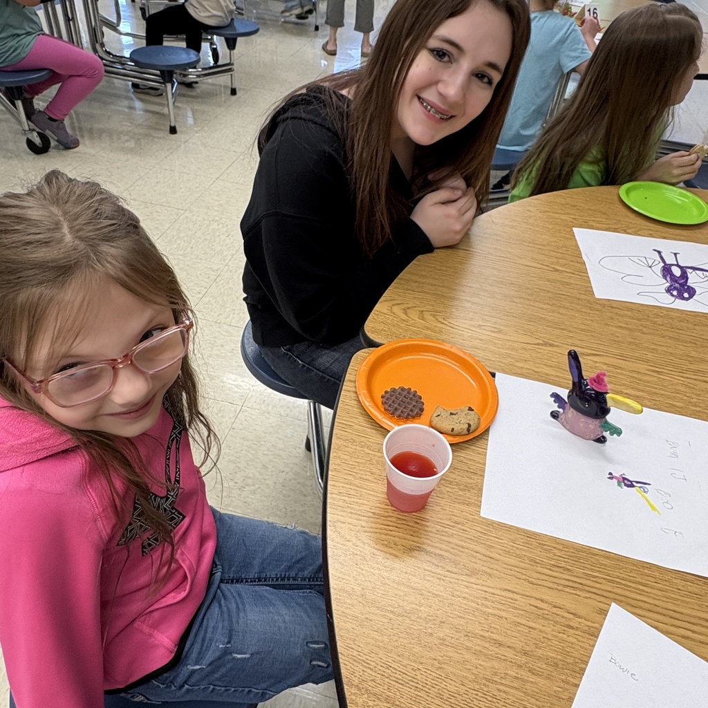 Students with their monsters