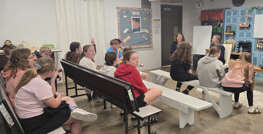 students on benches