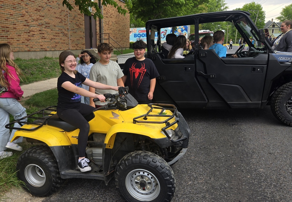 students on 4wheelers