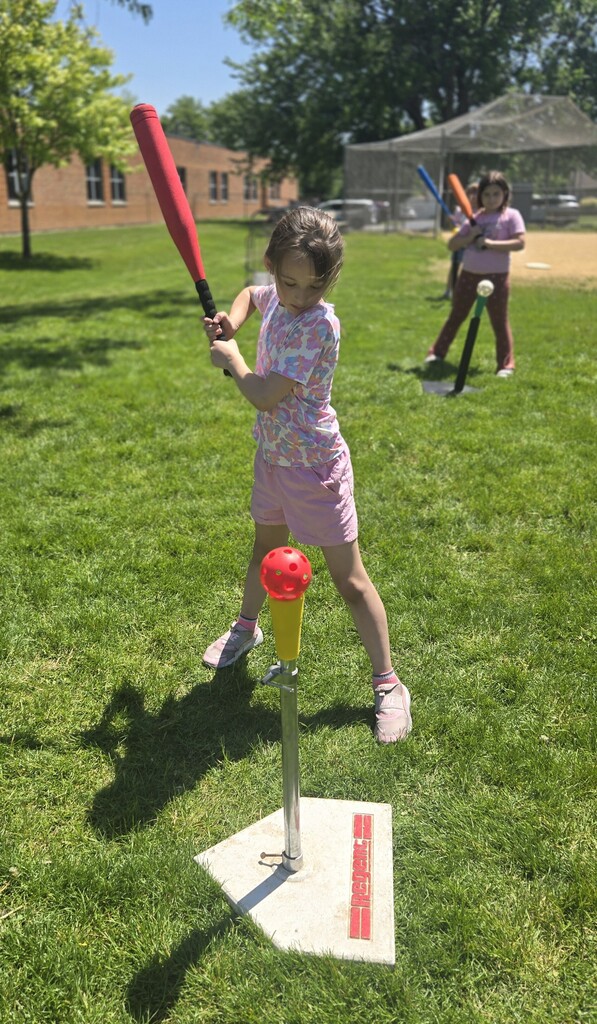 female student outside playing
