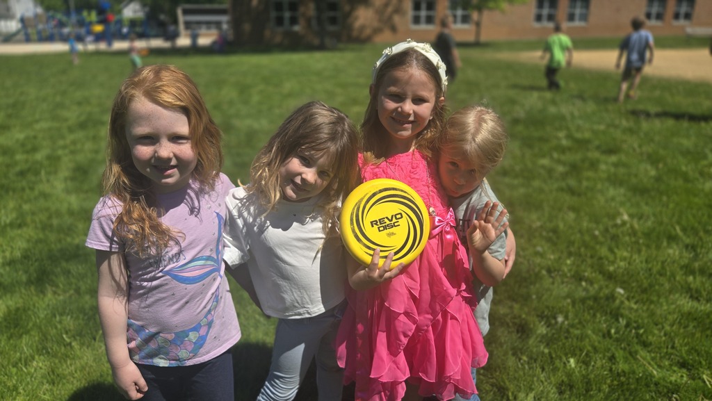 4 female students outside