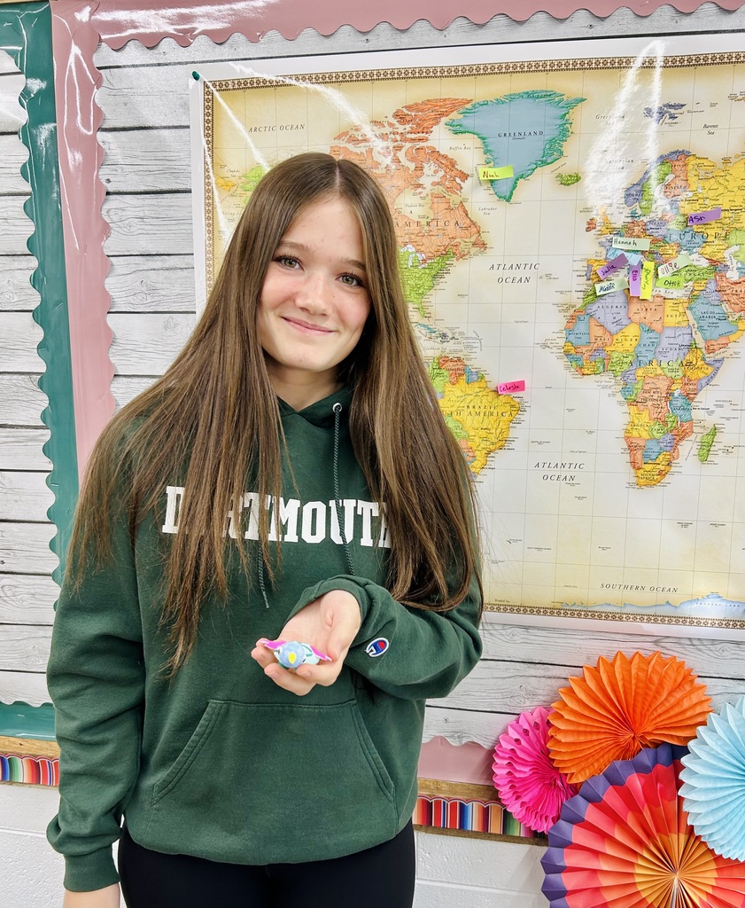 studnt holding  Alebrijes