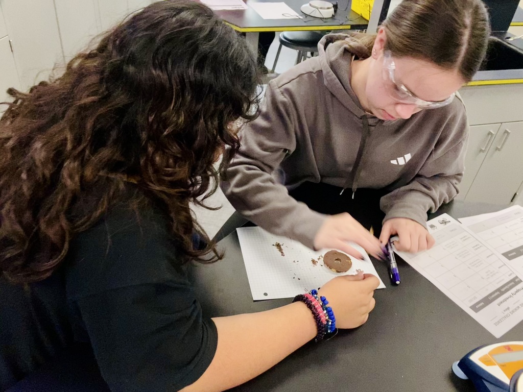 two students working together for 