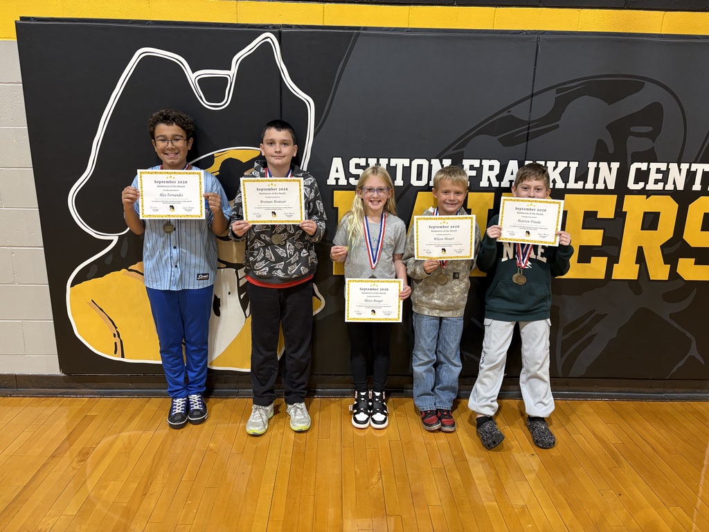 students posing with certificate