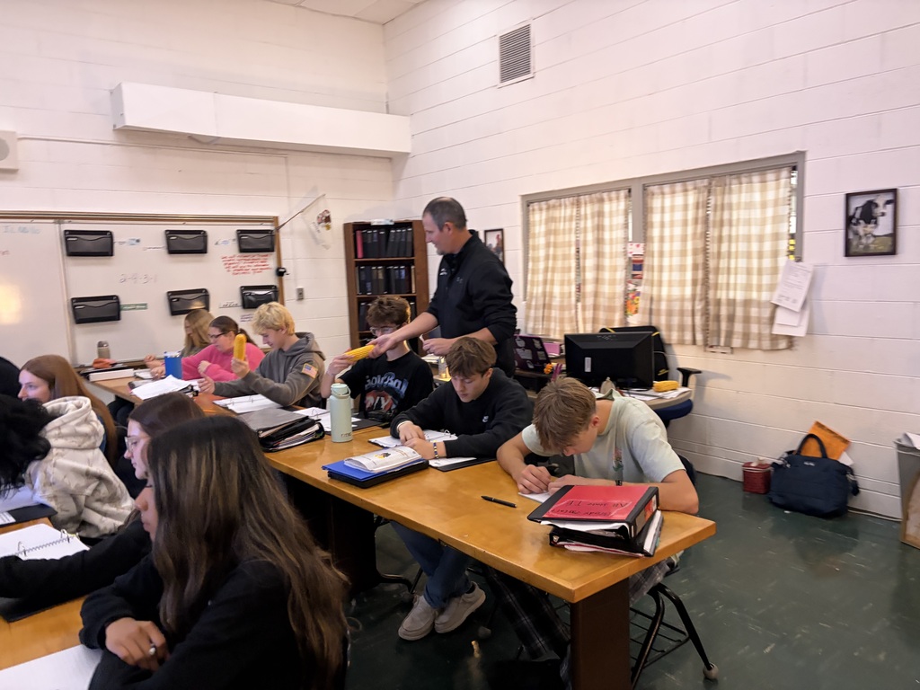 students in classroom with guest speaker