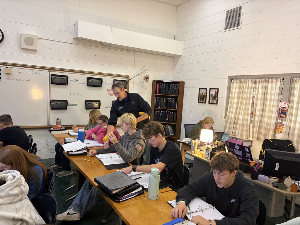 students in classroom with guest speaker