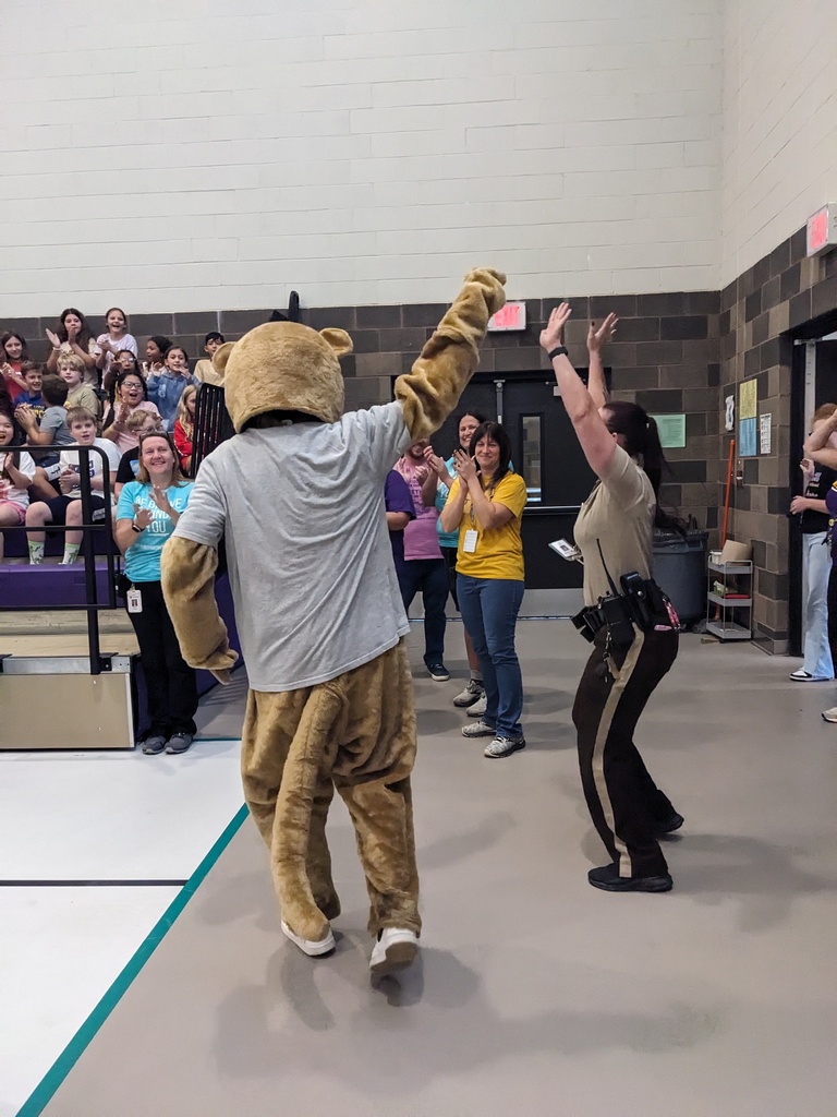 Cougar helping welcome Officer Meyer.