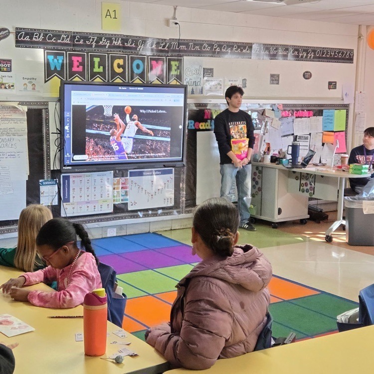 AHS students presenting to a captive audience at Mesnier