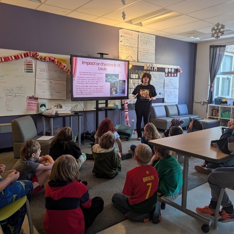 AHS students presenting to a captive audience at Gotsch