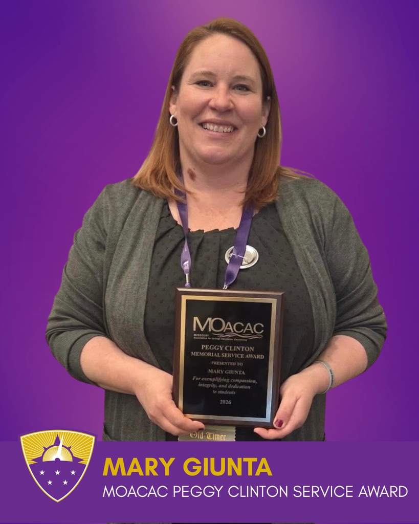 Award recipient Mary Giunta smiling while holding her 2026 MOACAC Peggy Clinton Memorial Service Award plaque.