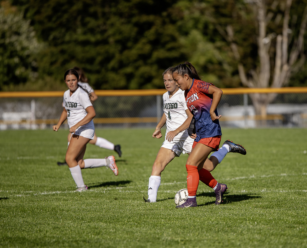 Afton player in possession of the ball