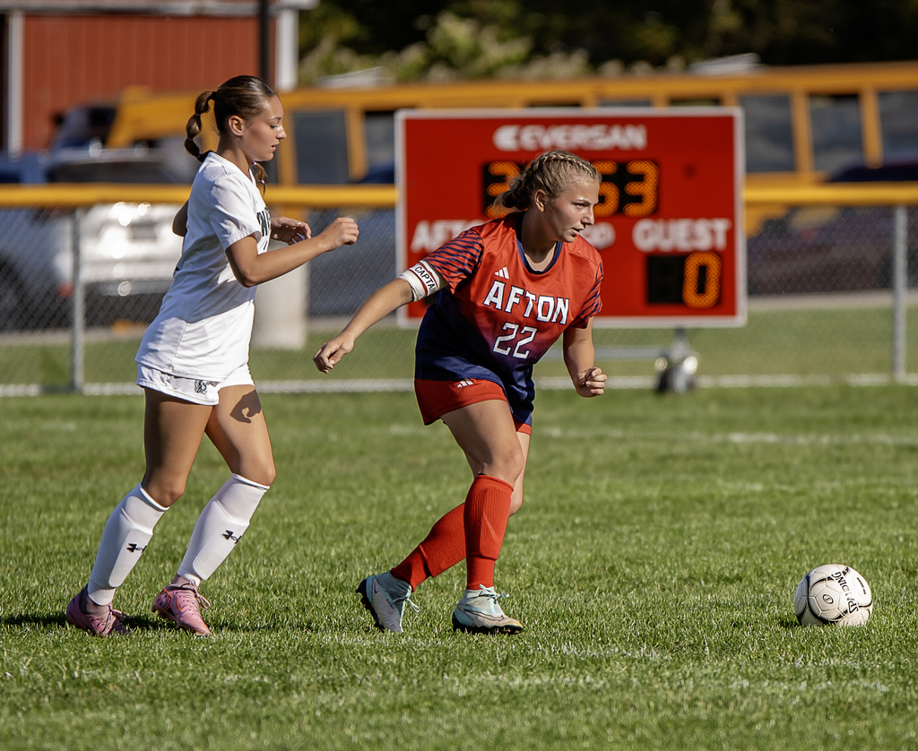 Afton soccer player in action with ball