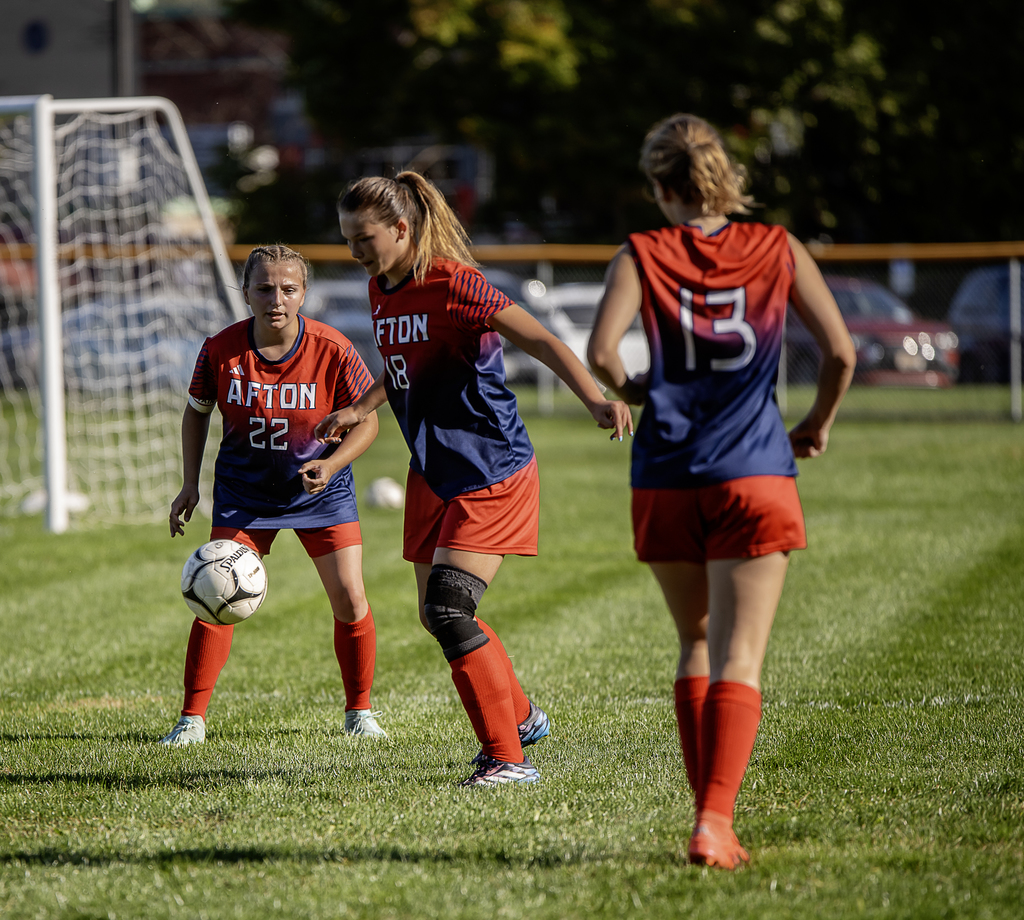 Afton soccer player in action with ball