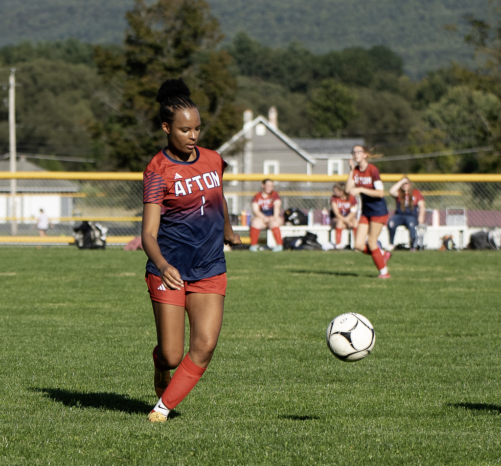 Afton soccer player in action with ball