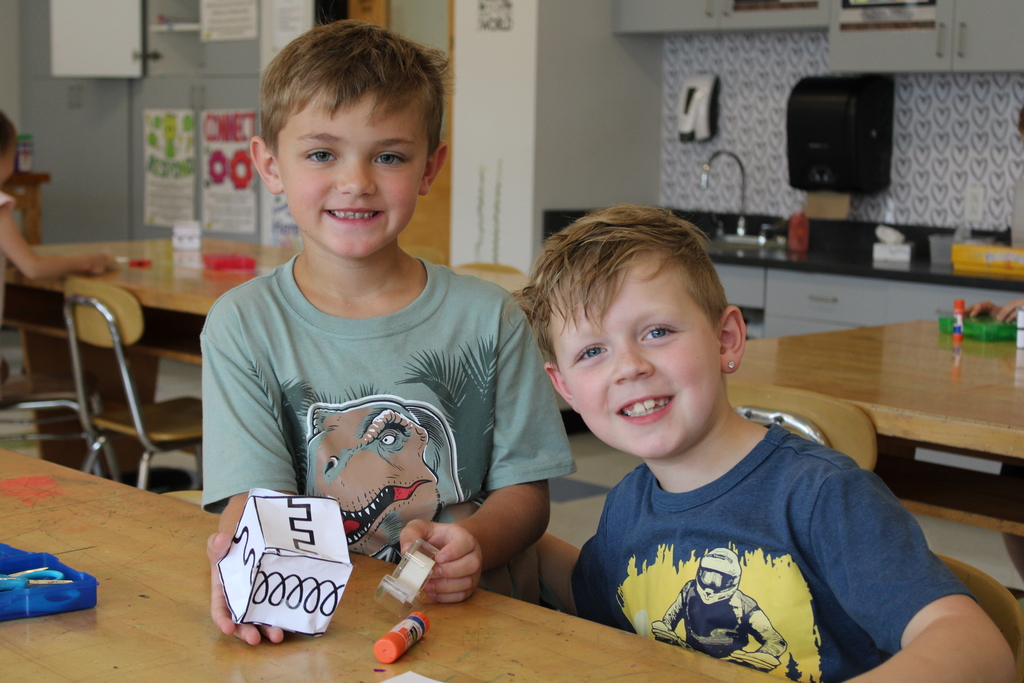 Afton Elementary students with paper cube
