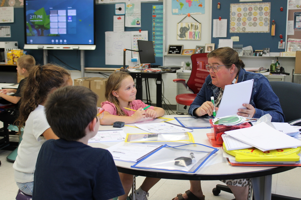 Ms. Mayo teaching a group of students!
