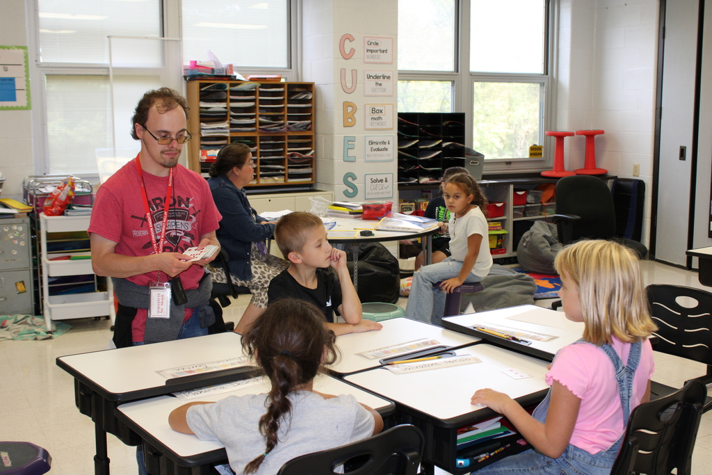 Teaching assistant working with students