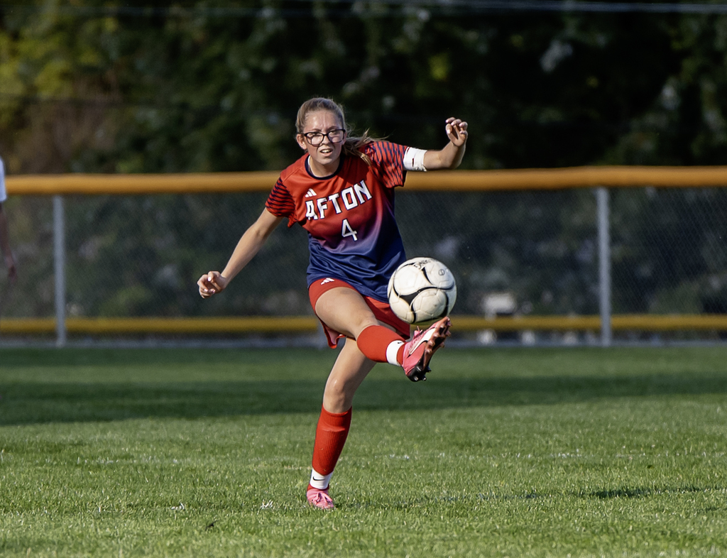 Afton Player with the Ball