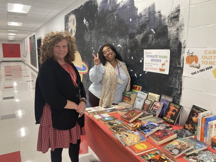 Afton ELA teachers with books display