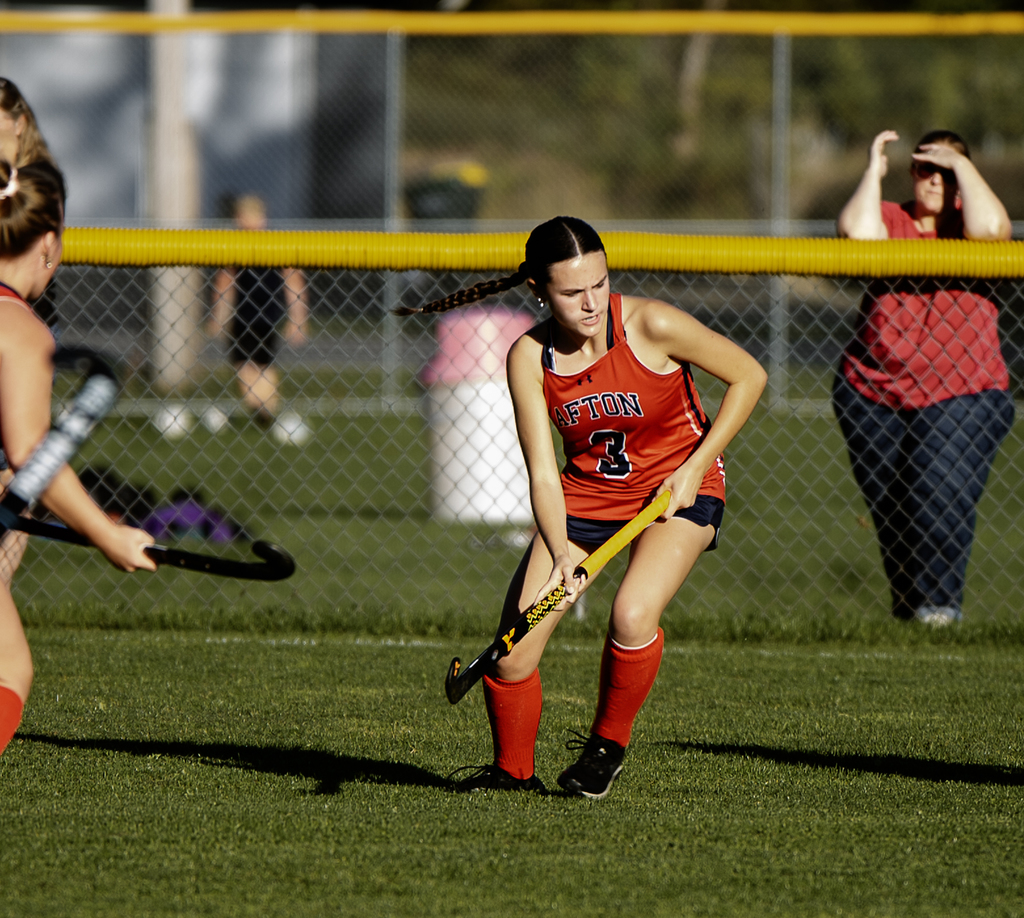 Afton player with the ball