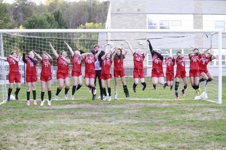 Girls modified soccer team celebrating win