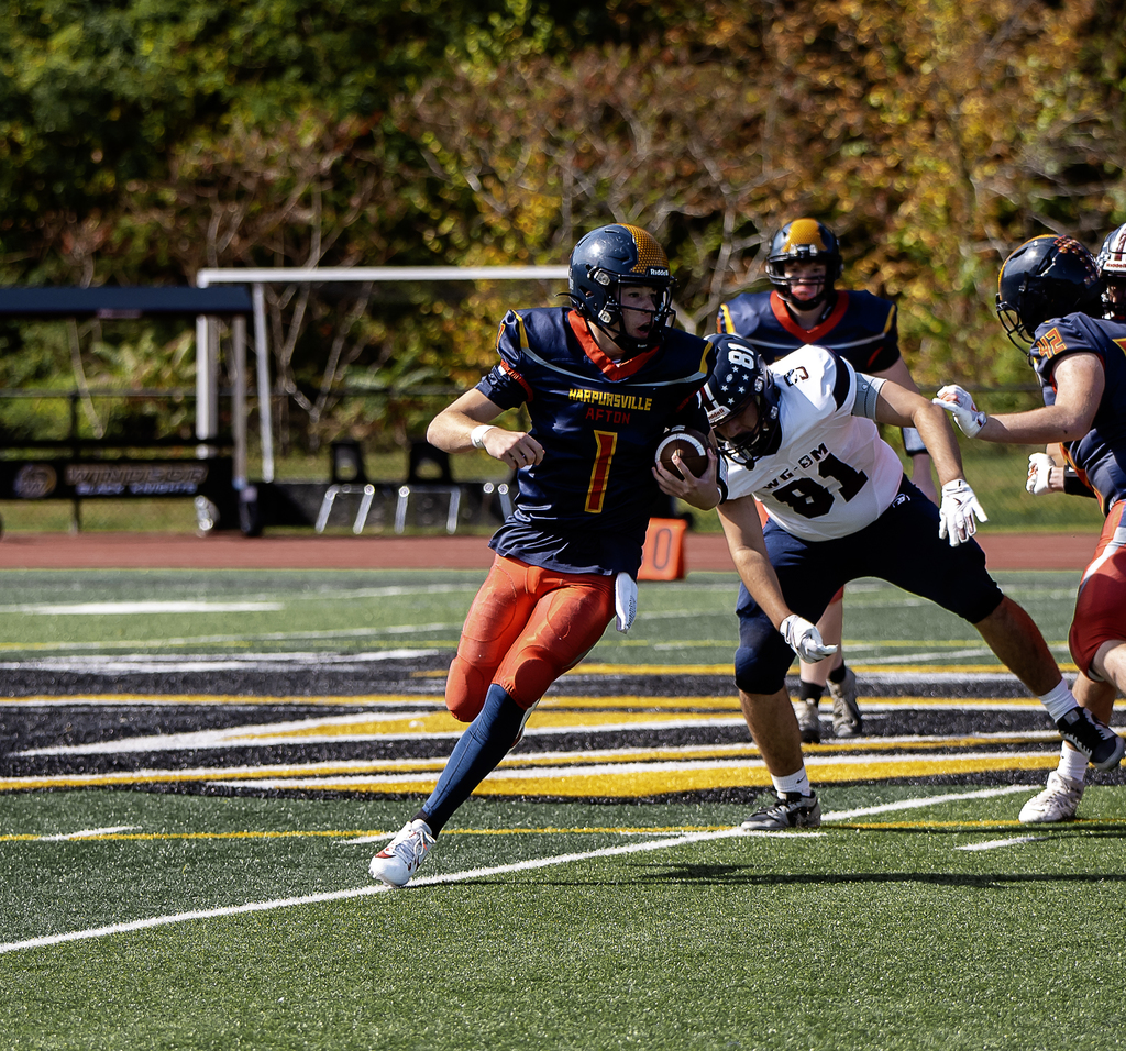 Football player running the ball