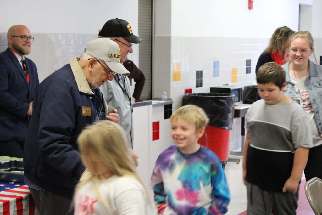 Veteran with students