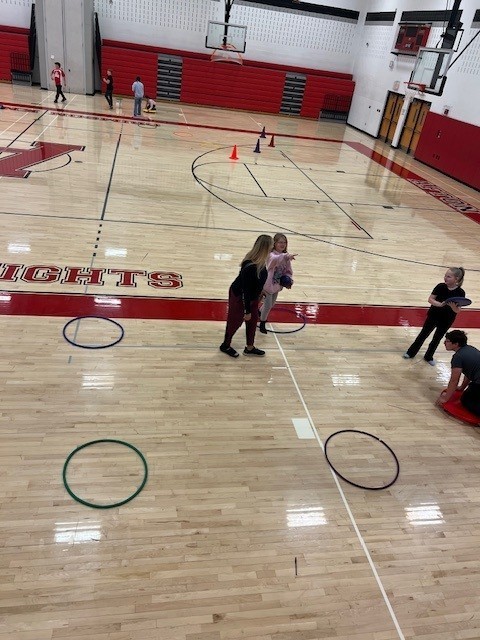 Students playing in the gym