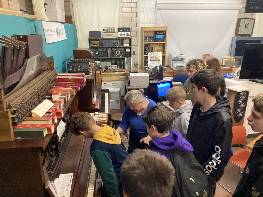 Students at player piano