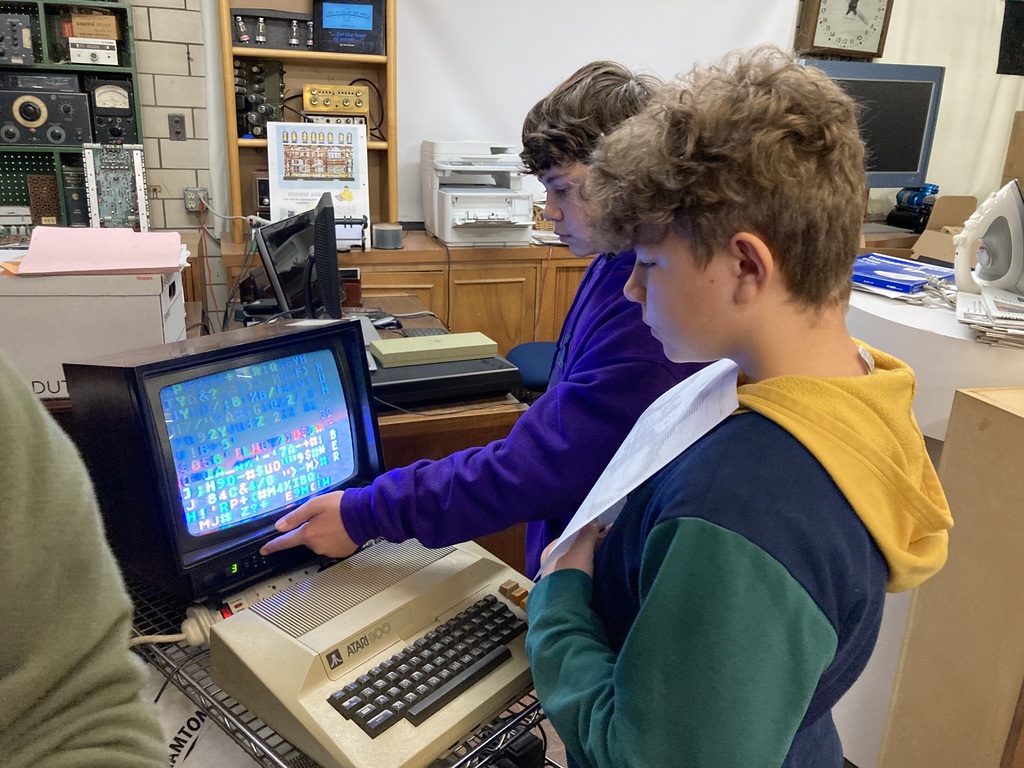 Students with old style computer