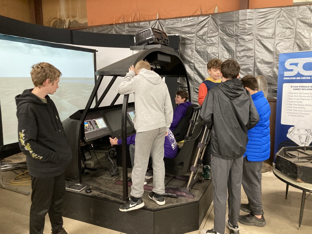 Students at helicopter simulator