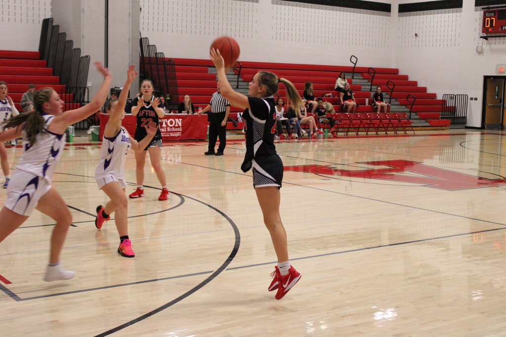 Afton student taking a shot