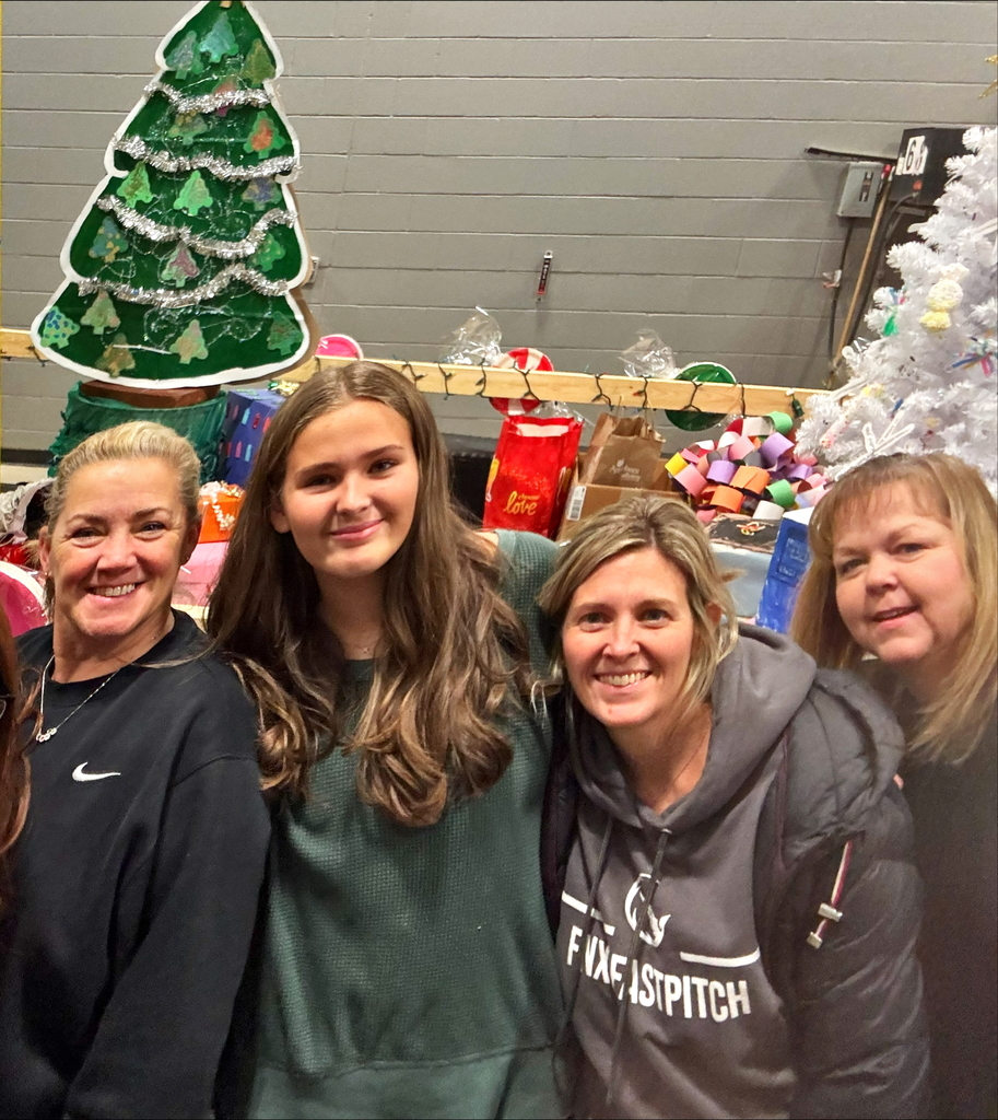 Smiling people contributing to float