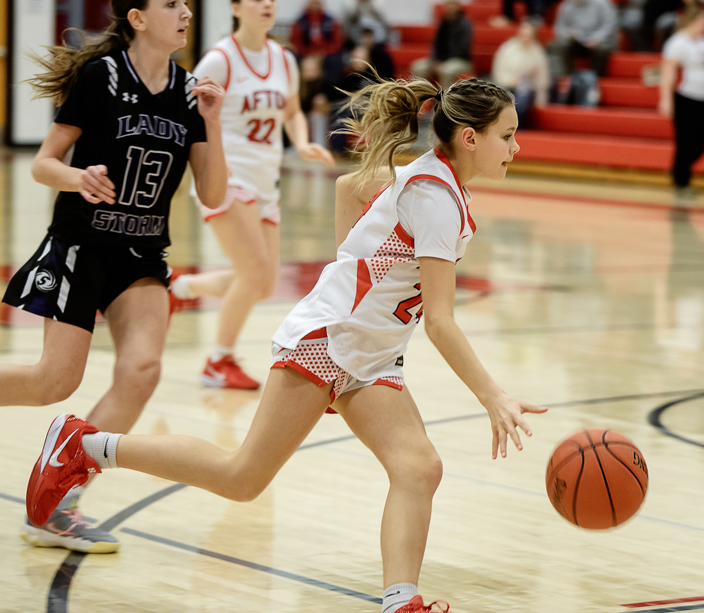Afton player in possession of the ball