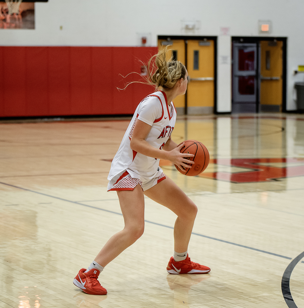 Afton player with the ball
