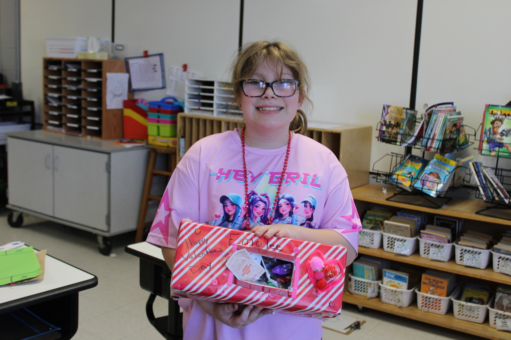 Afton student with valentines boxes