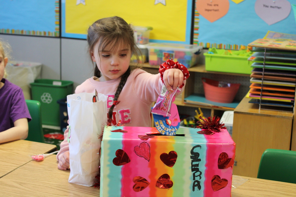 Afton student with Valentines day box