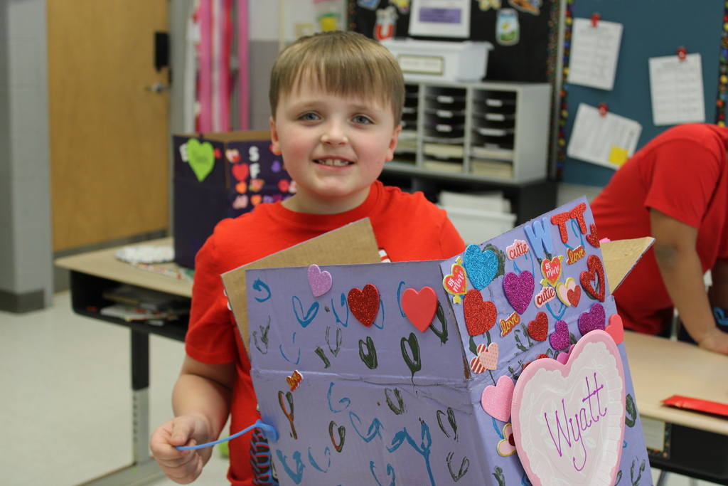 Afton student with box