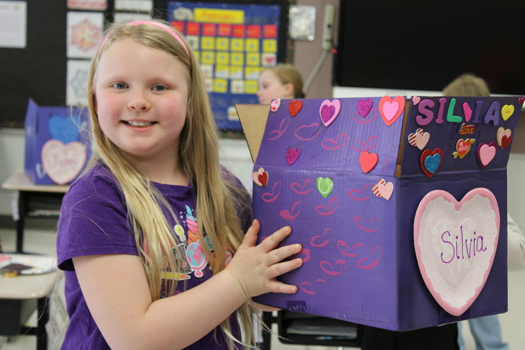 Afton student with box