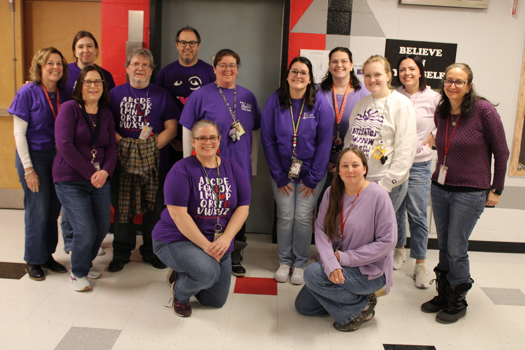 Staff wearing purple